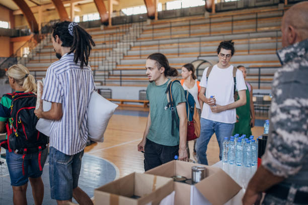 istock People receiving donations after natural disaster 1417729241