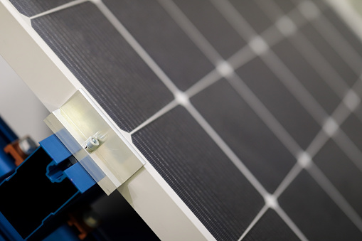 Solar cell panel with mounting brackets. Selective focus.