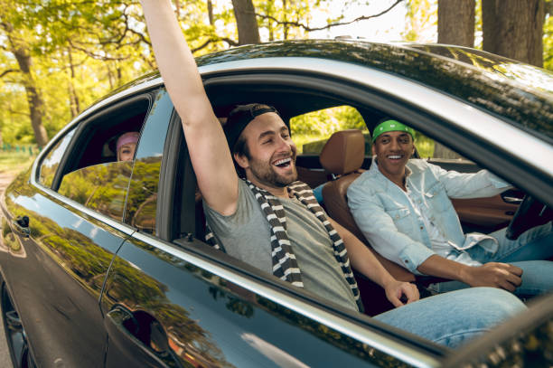 istock Young people in the car looking happy and contented 1417731683