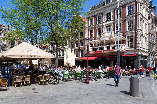 Amsterdam, Netherlands, May 28, 2017; People enjoy the beautiful weather on the terraces on the popular Leidseplein in the center of the city.