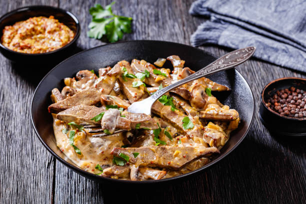 istock liver stroganoff in black bowl, top view 1417734368