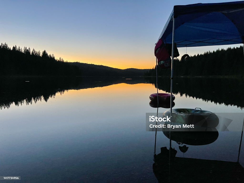 Lake at sunset Grey Lake at sunset on Vancouver island, BC Beauty Stock Photo