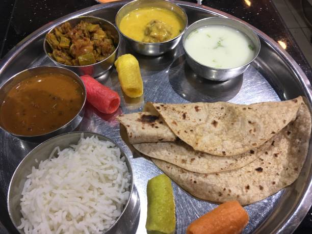 istock Indian Vegetarian Thali - Gujrati Cuisine 1417736890