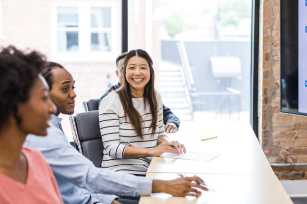istock Multiracial group of employees enjoy discussion during meeting 1417742148