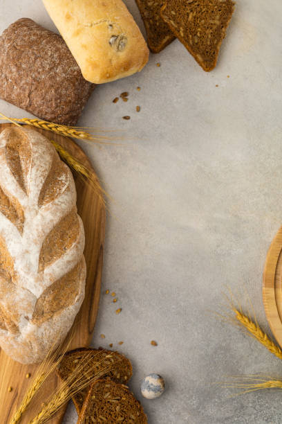 istock Various types of bread: rye, gluten-free, wheat, multi-cereal, on a light background 1417746815