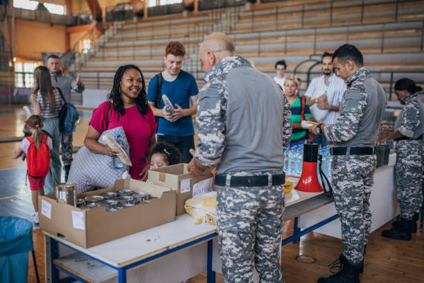 istock Civilians receiving donations after natural disaster 1417749631