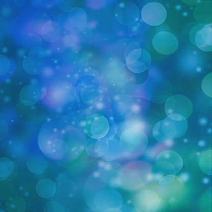 Blue shade holiday abstract background with blurred light bokeh circles.