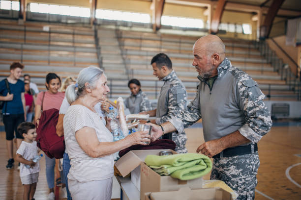 istock People receiving donations after natural disaster 1417751400