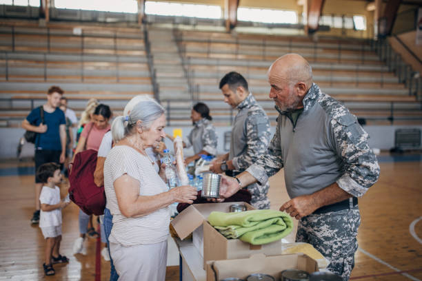 istock People receiving donations after natural disaster 1417751420