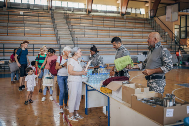 istock People receiving donations after natural disaster 1417751985