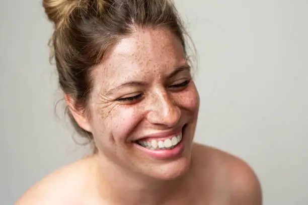 Beauty is in everyone.
Close-up portrait of a woman with freckles