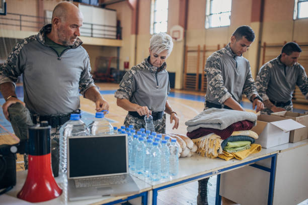 istock Soldiers preparing donations for civilians 1417756308