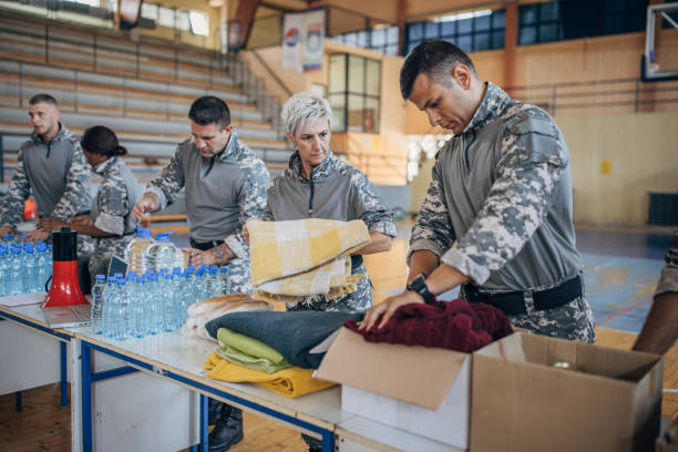 istock Soldiers preparing donations for civilians 1417756436