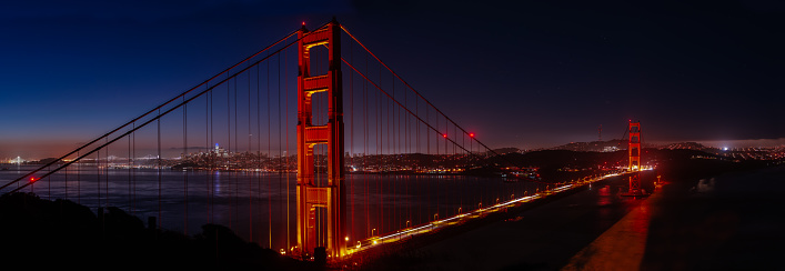 The iconic Golden Gate Bridge with cityscape of San Francisco, California, USA.