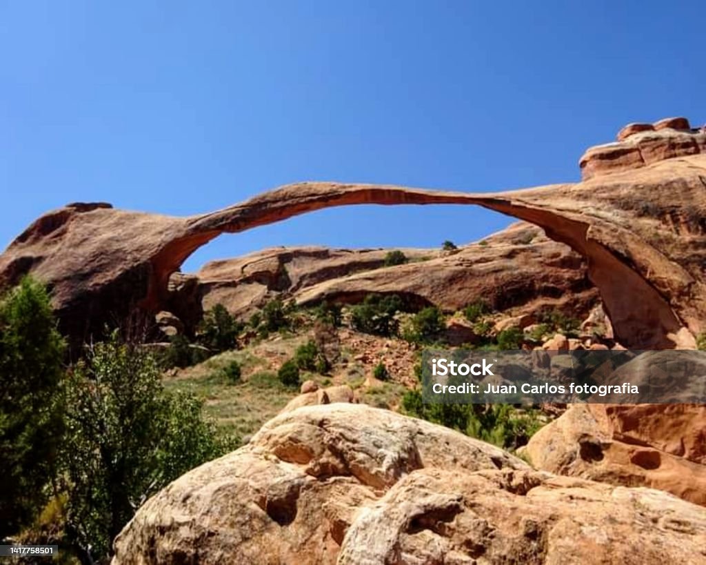 Arco Landscape is the longest of the many natural rock arches located in Arcos National Park, Utah, United States Landscape Arch is the longest of the many natural rock arches located in Arches National Park, Utah, United States. Landscape Arch Stock Photo