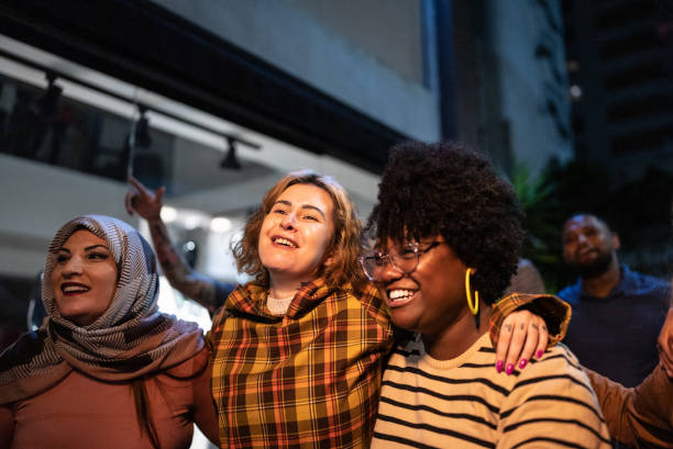 istock Friends walking and having a fun at city 1417765622