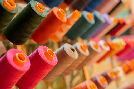 Close up view of a set of sewing threads