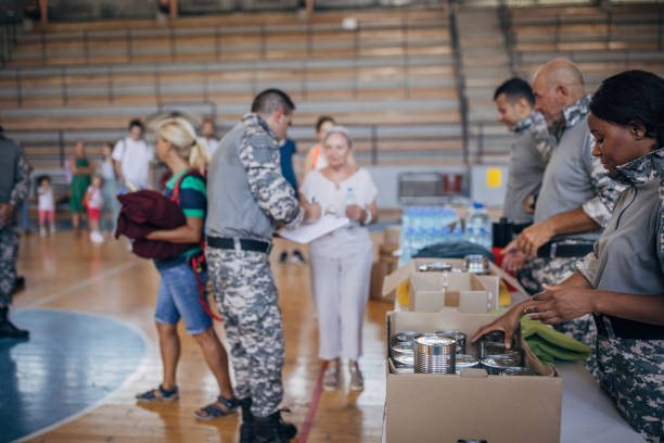 istock People receiving donations after natural disaster 1417771262