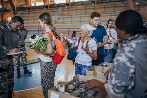 istock Civilians receiving donations 1417771427