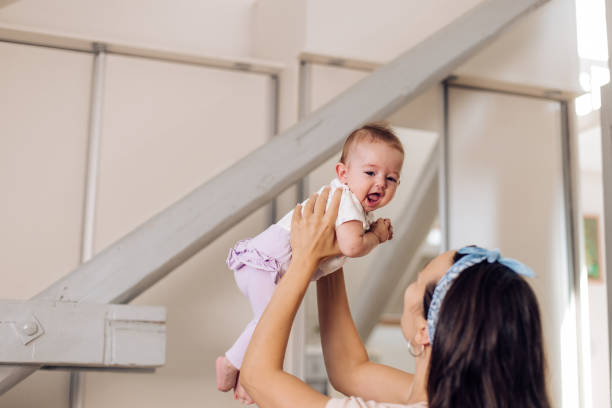 istock Young mother bonding with her adorable baby 1417780798