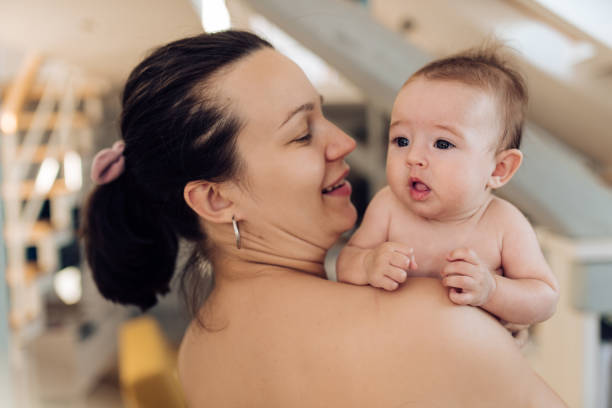 istock Young mother bonding with her adorable baby 1417780859