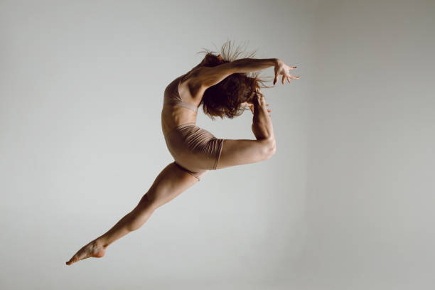 istock Young woman dancer dancing high heels dance. 1417781159
