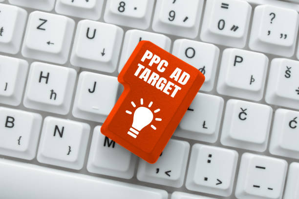 istock Conceptual display Ppc Ad Target. Internet Concept Pay per click advertising marketing strategies online campaign Piece Of Carboard With Important Message Surrounded By Colorful Pegs. 1417783100