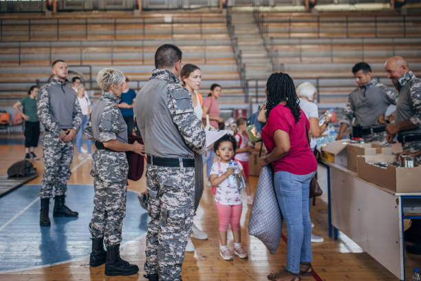 istock People receiving donations after natural disaster 1417785602