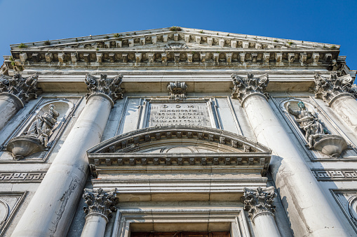 exterior of the Church of Santissima Trinità dei Monti,  a Roman Catholic church in Rome. The church is best known for its position above the Spanish Steps which lead to the famous Piazza di Spagna; Rome, Italy