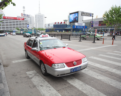 SHANGHAI, CHINA - MAY 13, 2010: Taxi at Shanghai Railway Station.Fast and convenient transportation for people traveling.