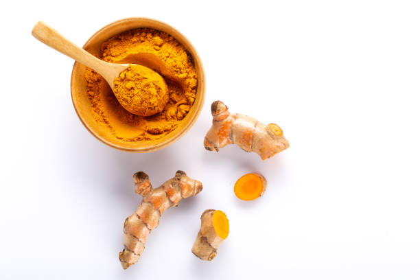 istock Turmeric powder and turmeric root isolated on white background ,Top view 1417804001