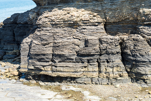 Strata and fault models appearing on the cliffs of Gyeokpo Port, Buan-gun, on the West Sea coast.