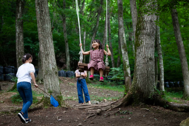 Three kids on summer vacation in nature