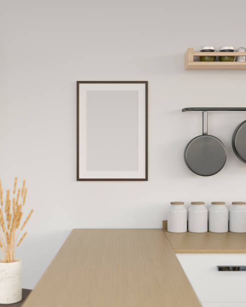 istock Picture frame mockup on white wall in the minimal kitchen room. close-up image. 1417838855