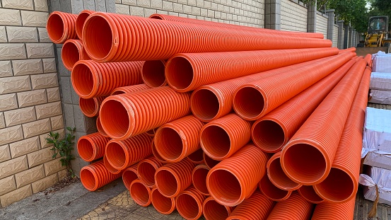 Stacked red water pipes