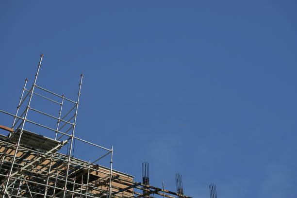 istock Aluminum Scaffolding & Ladder at a Construction Site with Blue Sky Background 1417847454