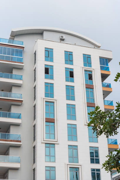 istock Modern tall residential apartment building with French windows. 1417848708