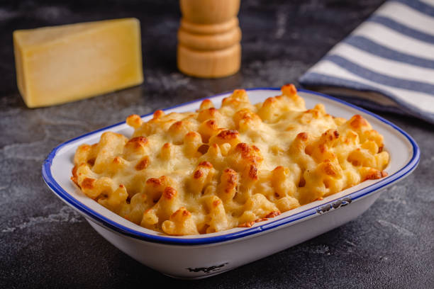 istock American mac and cheese, macaroni pasta in cheesy sauce 1417850013