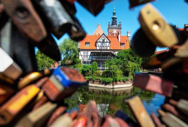 Gdansk, Poland - June 22, 2022: old Miller's House in the historic quarter of Gdansk, Pomeranian Voivodeship in Poland. Popular tourist attraction, streets of a winter European city on the Baltic Sea
