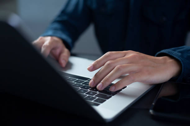 istock Person are using laptops, working or studying online at home. businessman using laptop work outside the office 1417857883