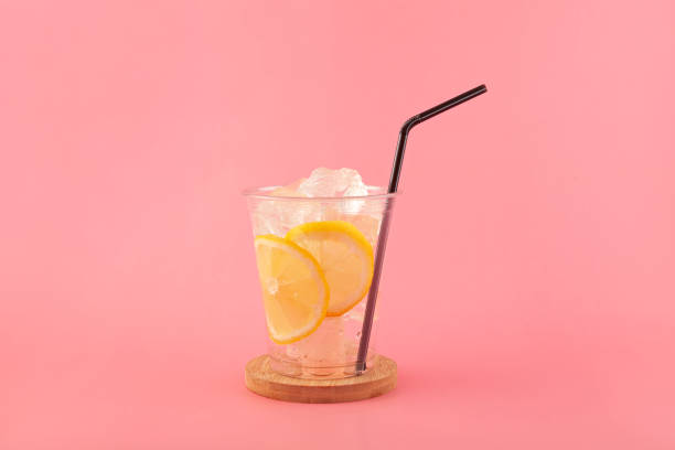 Fresh Ice Tea In Plastic Glass With Straw Stock Photo, Picture and Royalty  Free Image. Image 29464317.