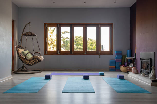 istock Yoga mats and blocks placed on hardwood floor in studio 1417864544
