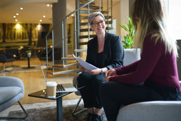 istock Female professionals discussing in meeting at office 1417866290