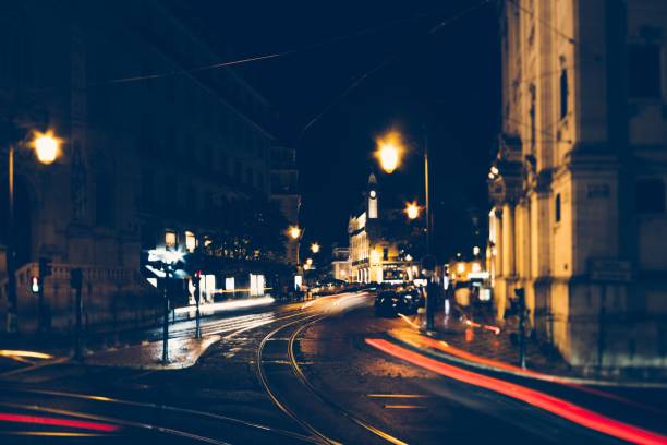 istock Long exposure light trails along the street in Lisbon at night 1417869876