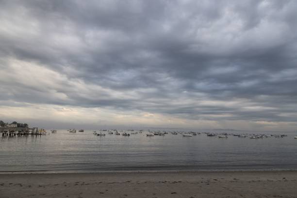 istock Dreary cloudy beach dark moody water Swampscott 1417876453
