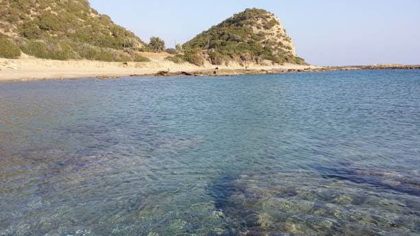 istock Cyprus turquoise beach and land from higher view point 1417876475