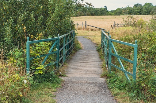 Bridge at Big Waters Nature Reserve, on reclaimed mining land, on the outskirts of Newcastle upon Tyne, UK.