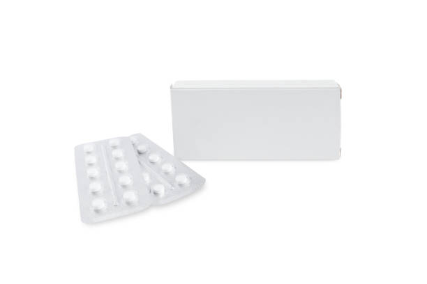 istock Isolate a box with medicines and two blisters of pills nearby 1417881061