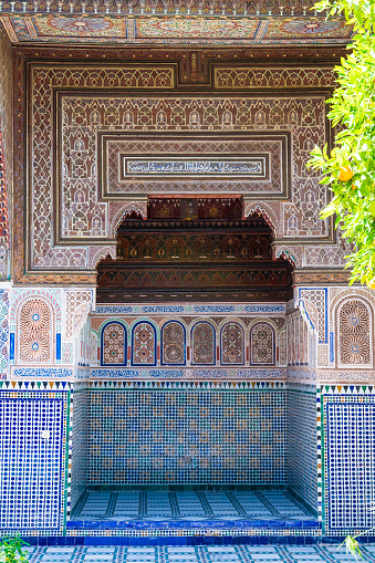 The courtyard of the Bahia palace. Room with an arched passage in the traditional Moroccan style.