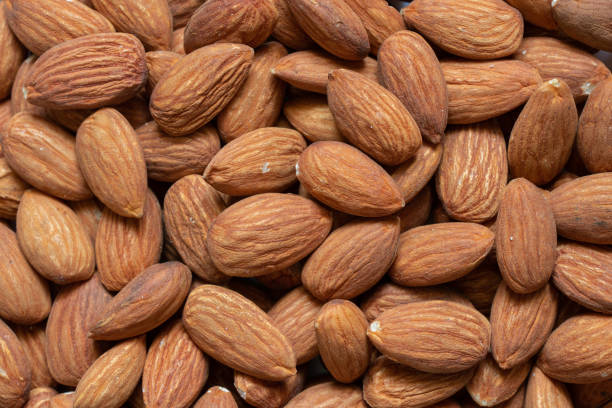 istock almond on isolated background, whole nut 1417884750